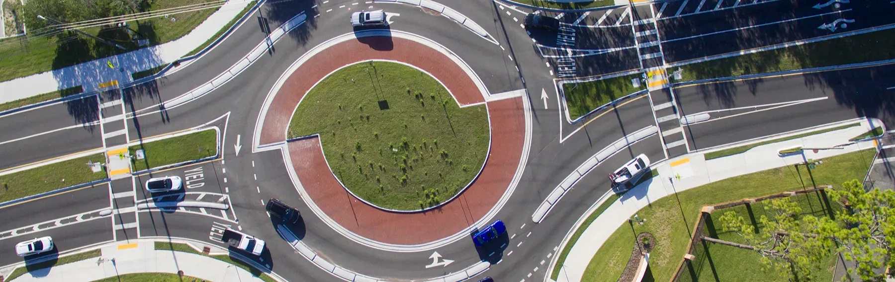 A roundabout with cars