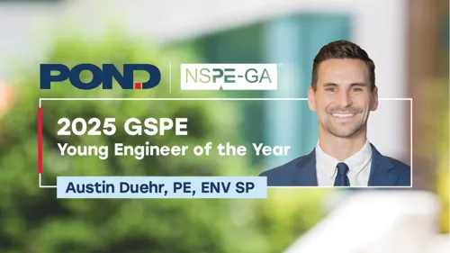 Austin Duehr headshot with blurry green background - 2025 GSPE Young Engineer of the Year Award